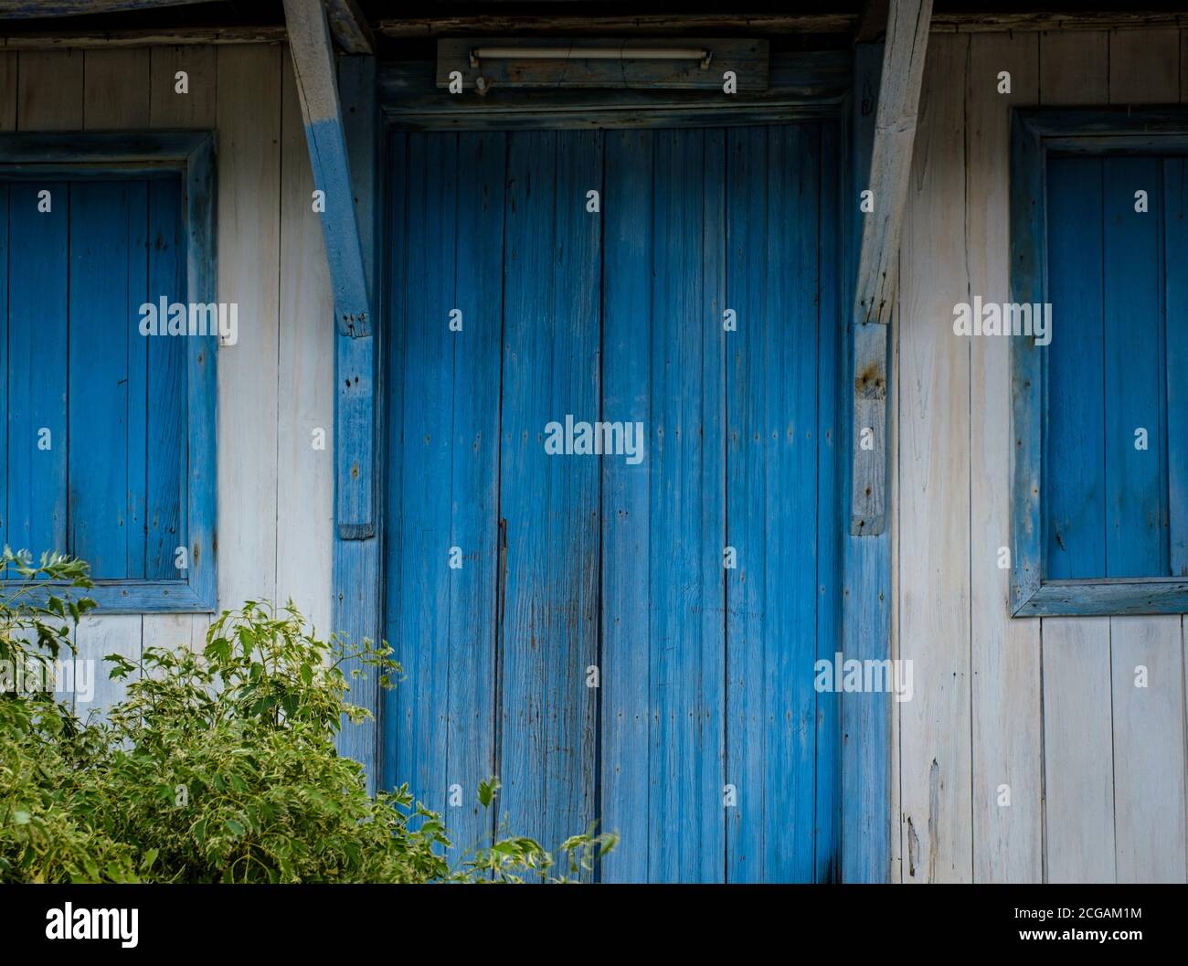 SANTIAGO DE CUBA, CUBA - CIRCA JANUARY 2020: Old wooden doors and windows in Cayo Granma in Santiago de Cuba Stock Photo