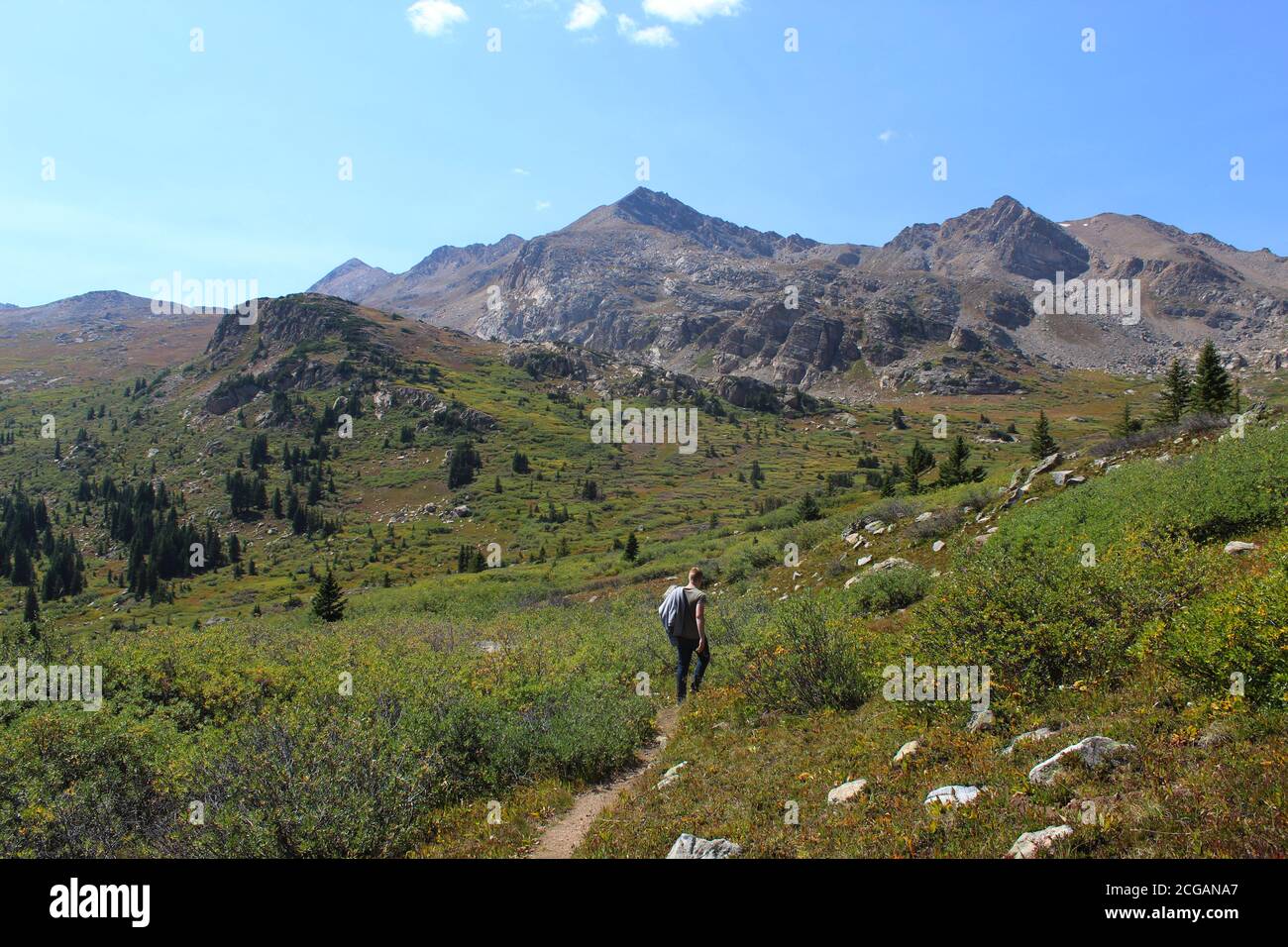 Teenage Boy (white, Caucasian) Hiking through the Mountains in the San Isabel National Park Stock Photo