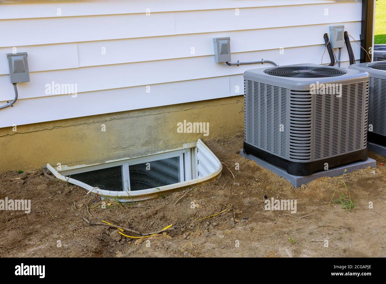 Air conditioning system assembled on performing preventive maintenance on a air conditioning condenser refueling the air conditioner with freon Stock Photo