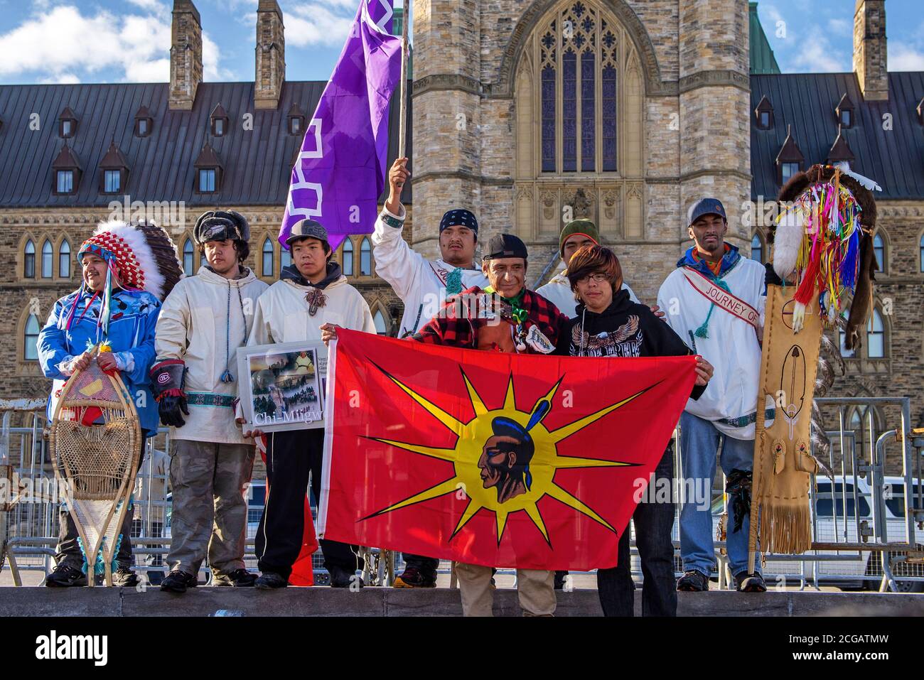 Ottawa, Canada - March 25, 2013: The group of Cree youth that walked 1600 kilometers from their home in Whapmagoostui, Que to bring attention aboriginal issues at the end of their journey on Parliament Hill in Ottawa, Ontario Part of the Idle No More Protest Stock Photo