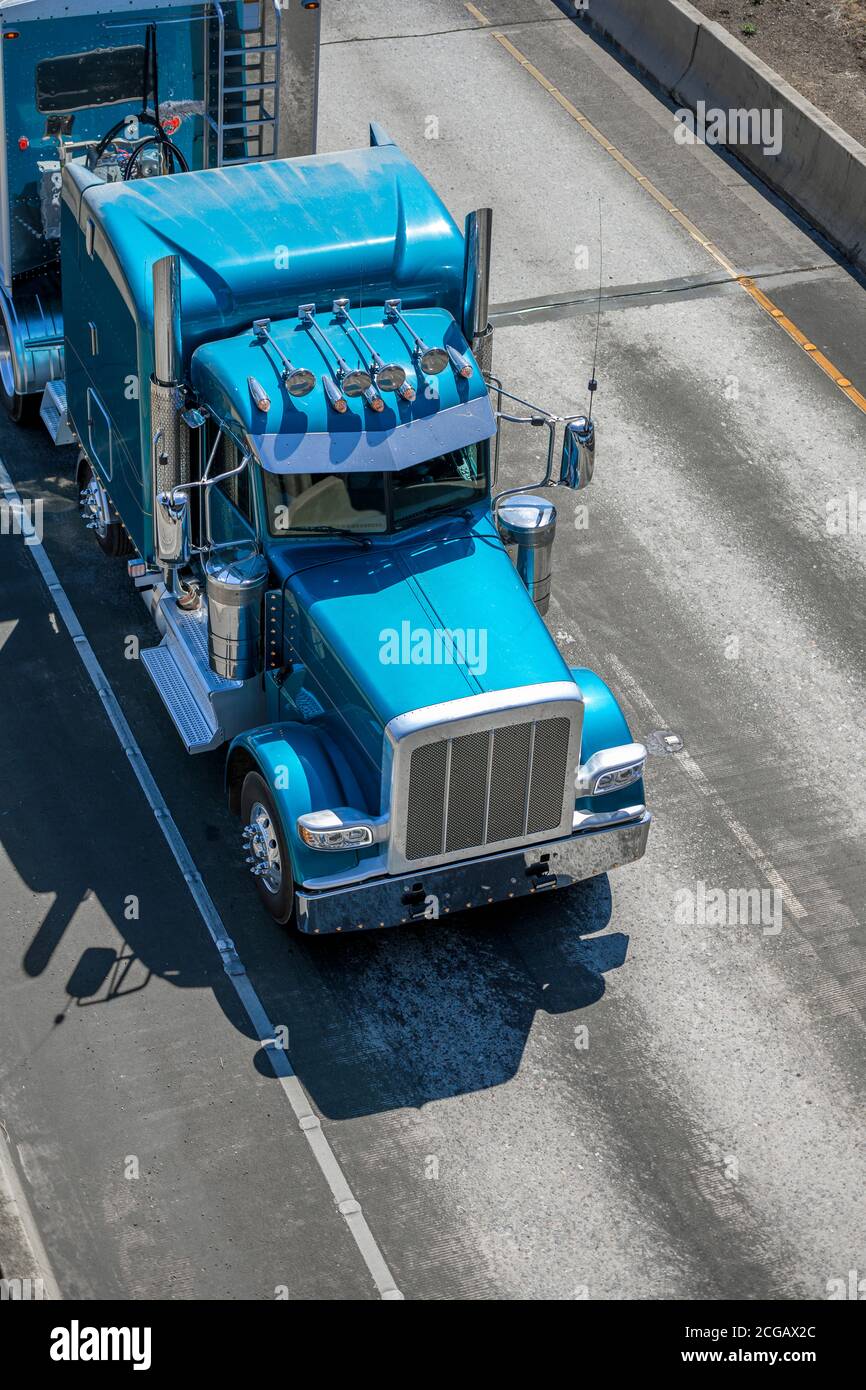 Bright blue industrial diesel long haul classic big rig semi truck ...