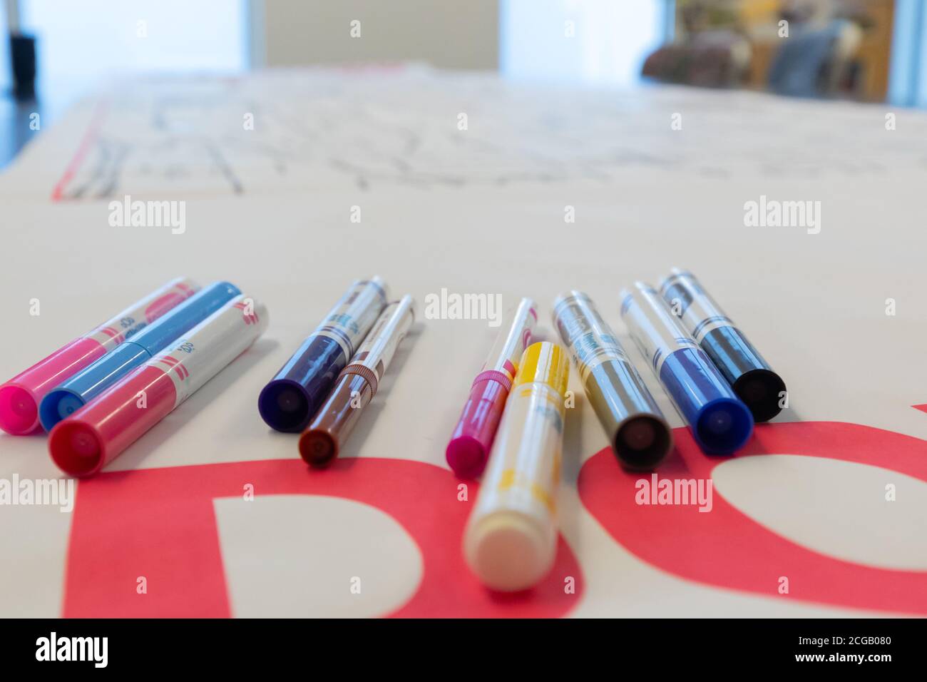 Permanent markers on a table Stock Photo Alamy