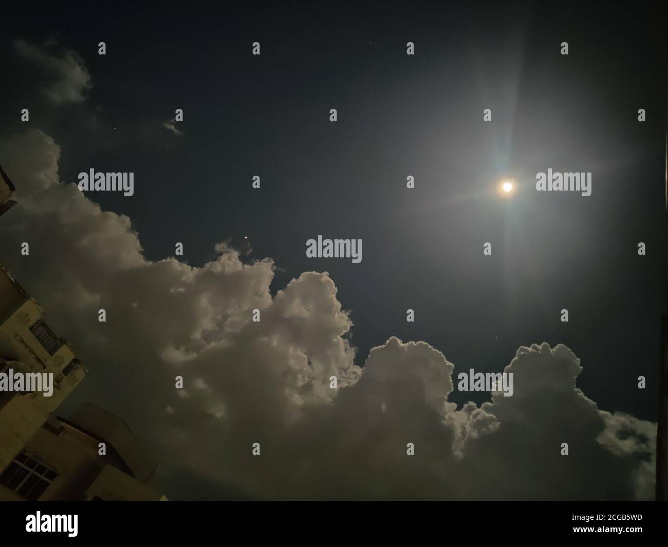 Beautiful sky and moon on a full moon night Stock Photo - Alamy