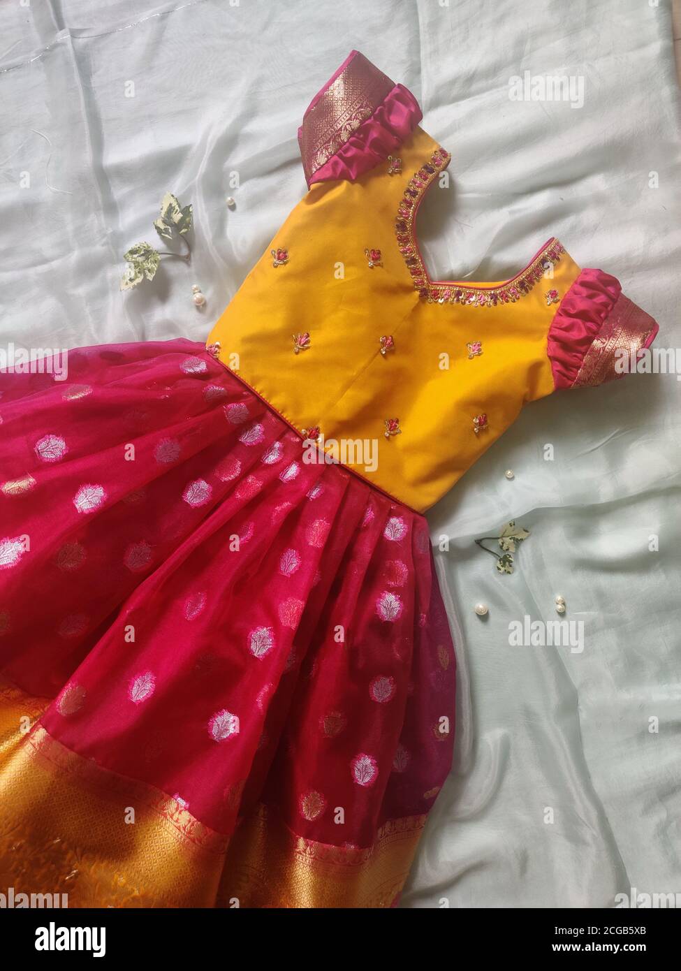 Indian designer wear for woman and children colourful traditional model  designs blouses long gowns and all Indian western wear Stock Photo - Alamy