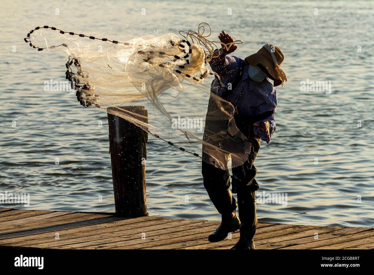 Throwing the net hi-res stock photography and images - Page 4 - Alamy