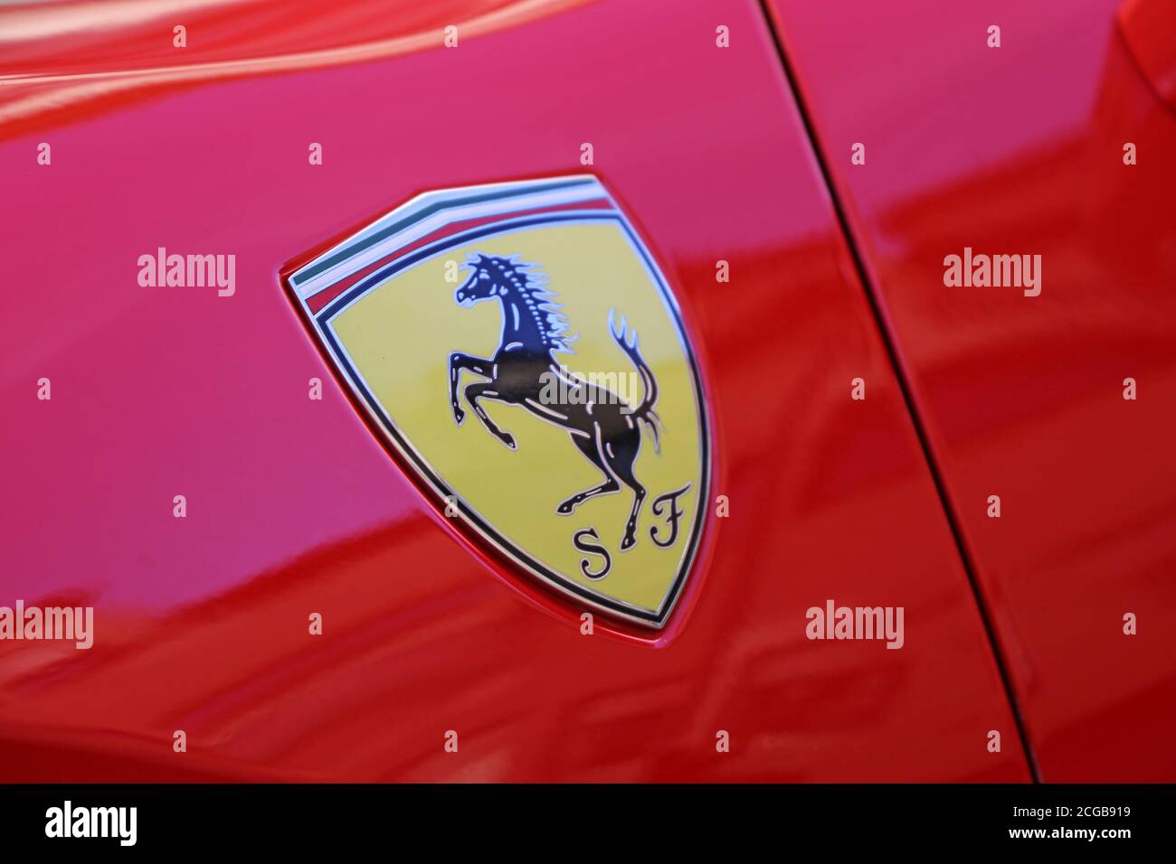Ferrari logo on a red Ferrari Stock Photo