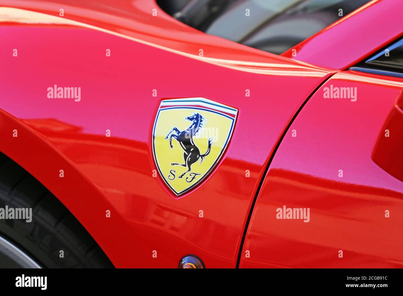 Ferrari logo on a red Ferrari Stock Photo