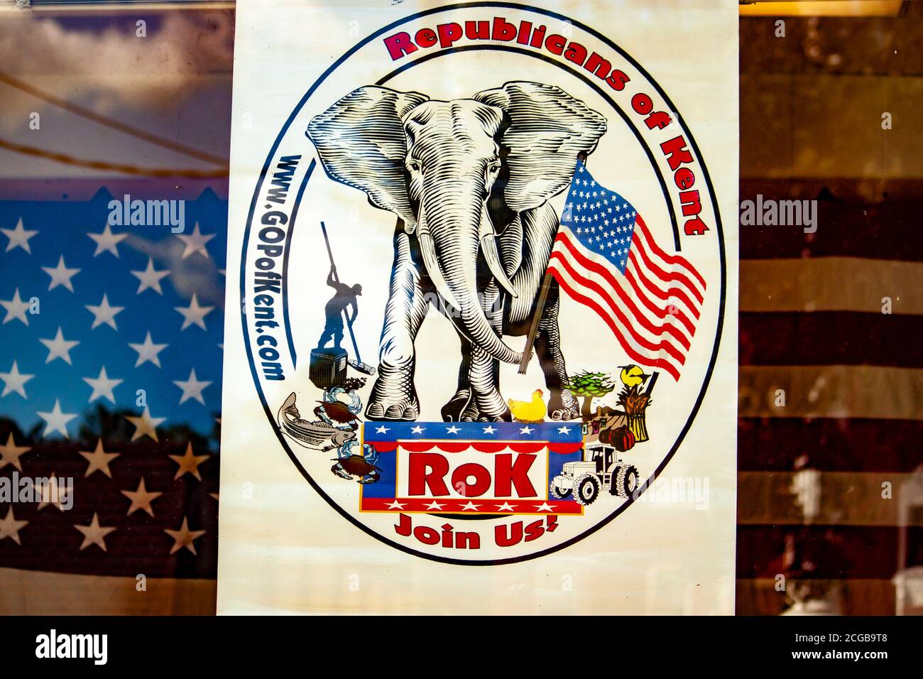 Chestertown, MD, USA 08/30/2020: Window display of the Republican Party campaign office with flags and illustrations to promote re election of Donald Stock Photo