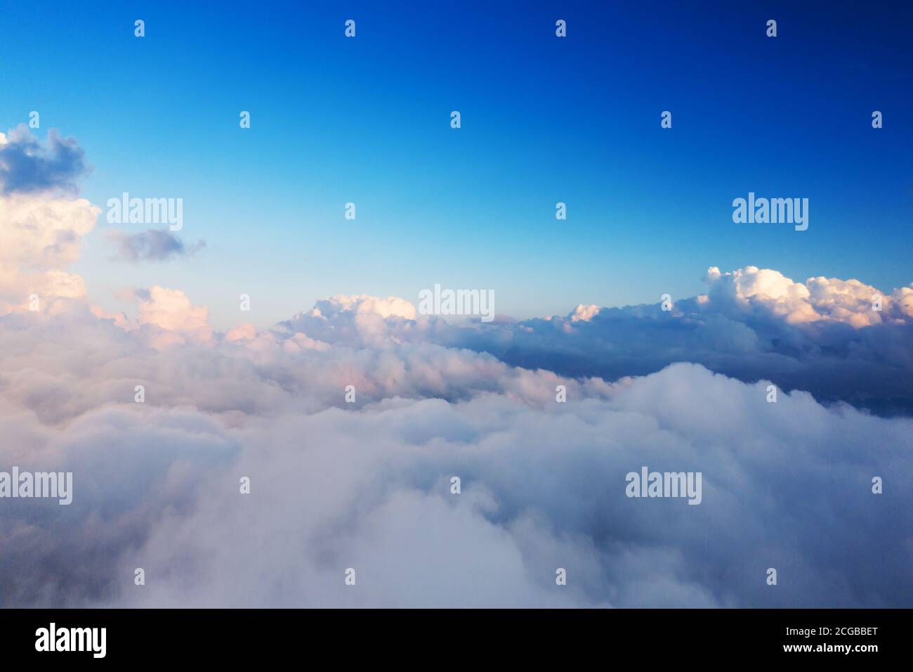 Beautiful sunset cloudy sky from aerial view. Airplane view above ...