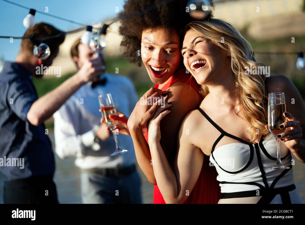 Group of friends having fun and celebrating group gathering outdoor ...