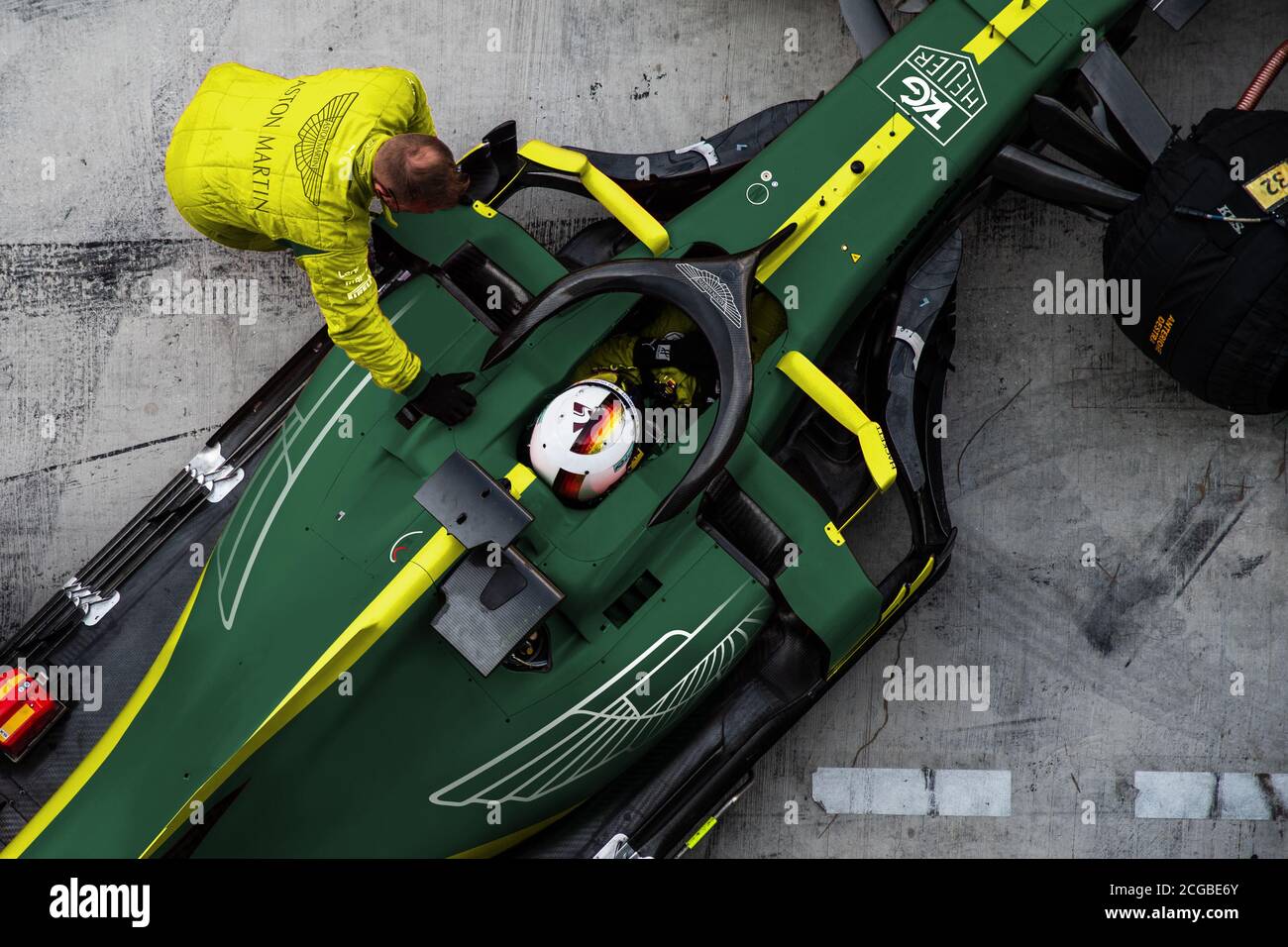 An artist&rsquo;s impression on 4-time world champion Sebastian Vettel in Aston Martin F1 car