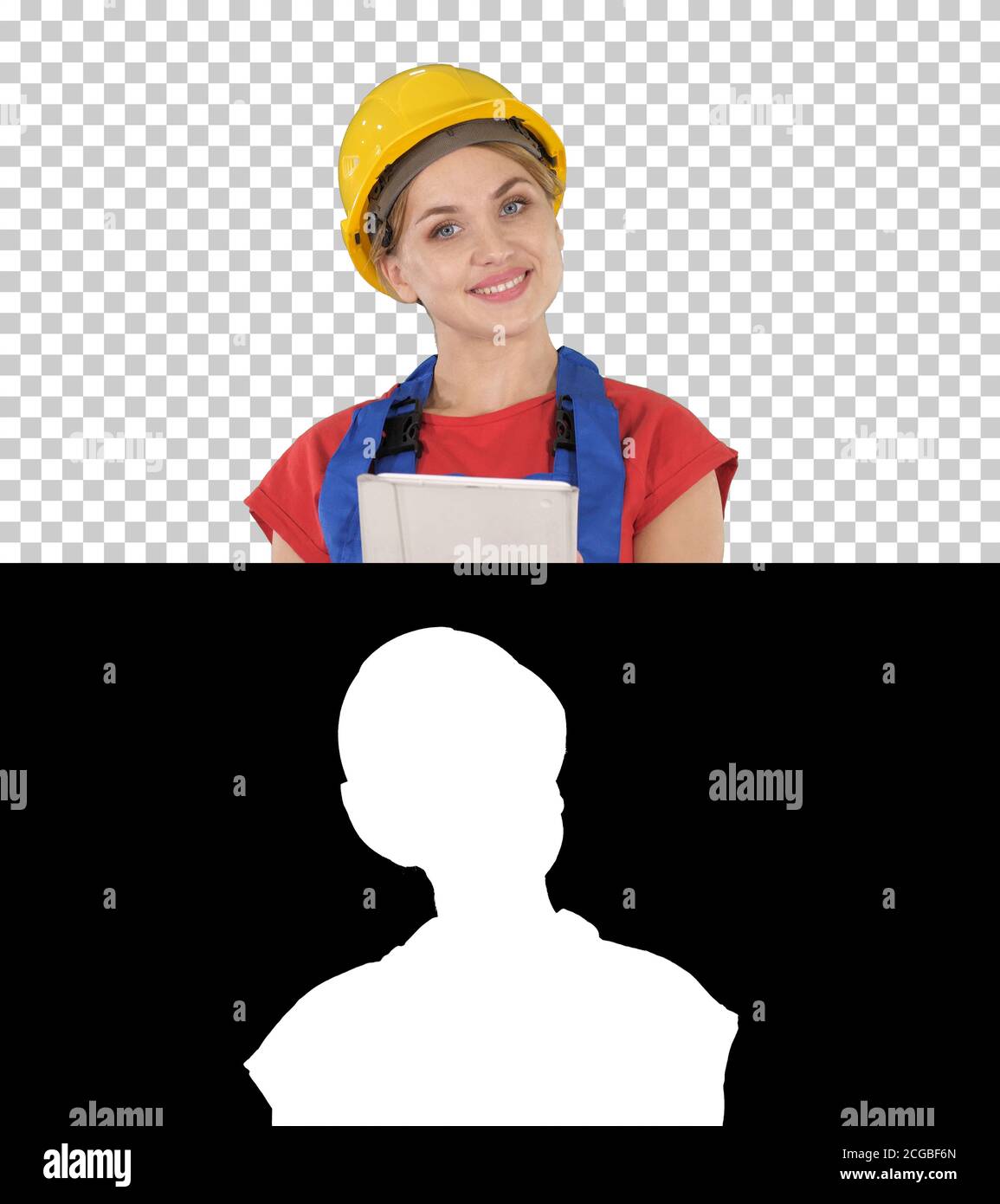 Young construction worker with tablet computer presenting something, Alpha Channel Stock Photo