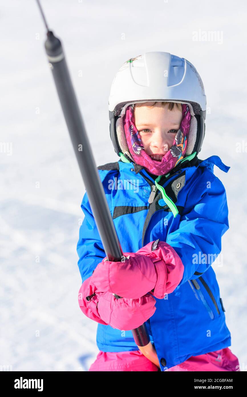 Cute little girl on skis Stock Photo Alamy