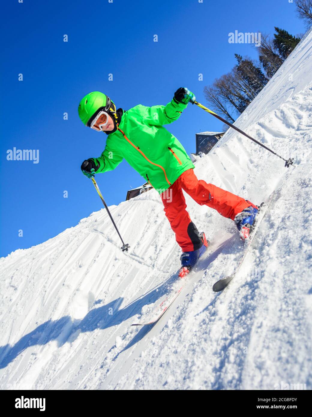Little skiers learn to ski on a wellprepared slope and have a lot of