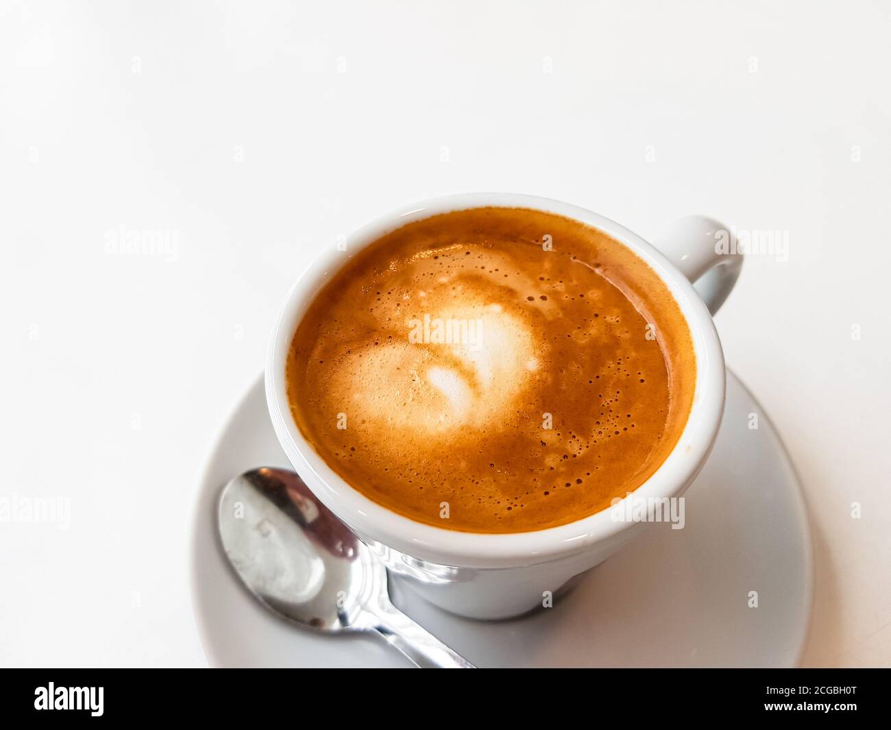 Cortado-Spanish coffee with milk in a small Cup. Stock Photo