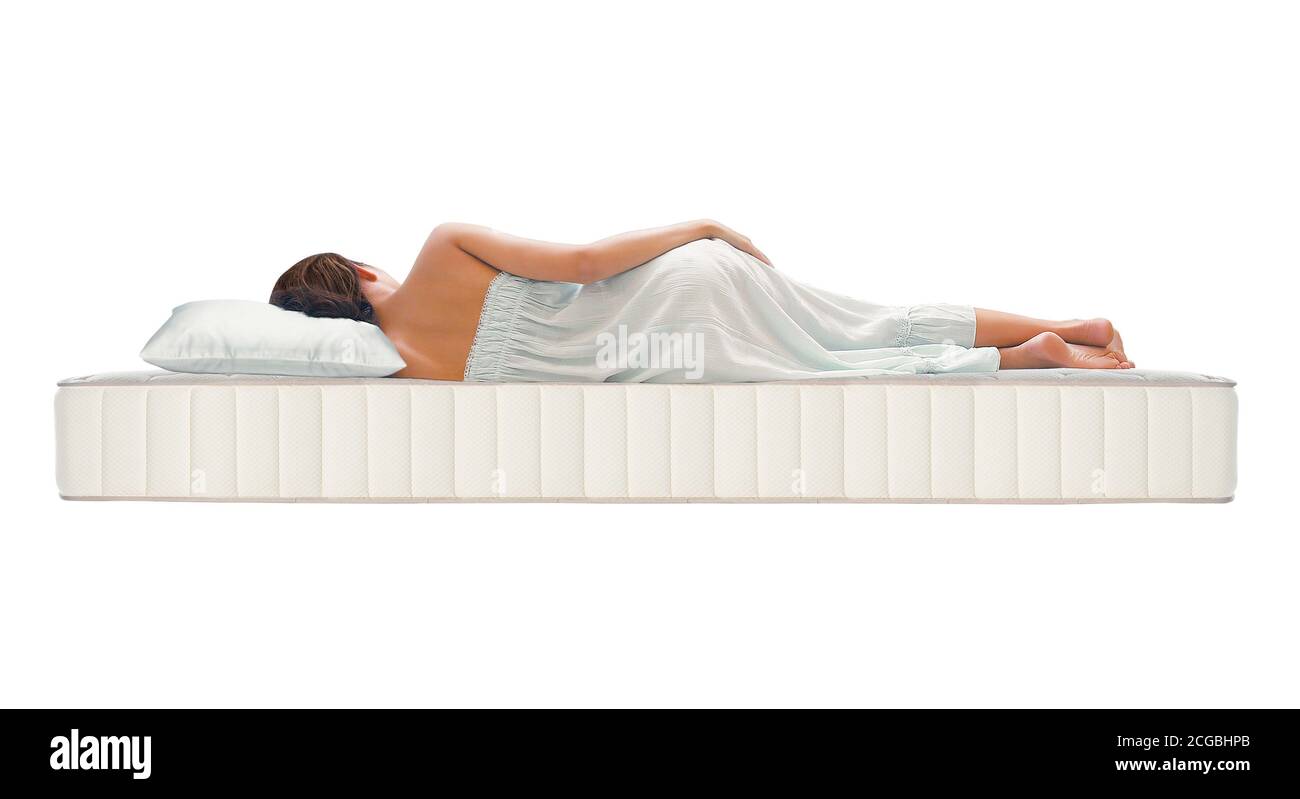 Woman sleeping on the side posture on orthopedic mattress Stock Photo