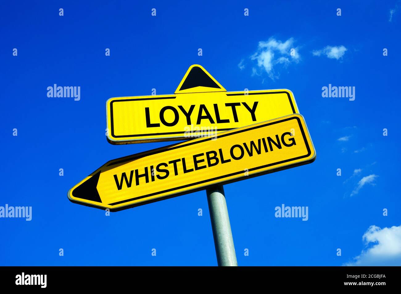 Loyalty or Whistleblowing - Traffic sign with two options - Appeal to expose illegal, unethical and not correct activities because of public good Stock Photo