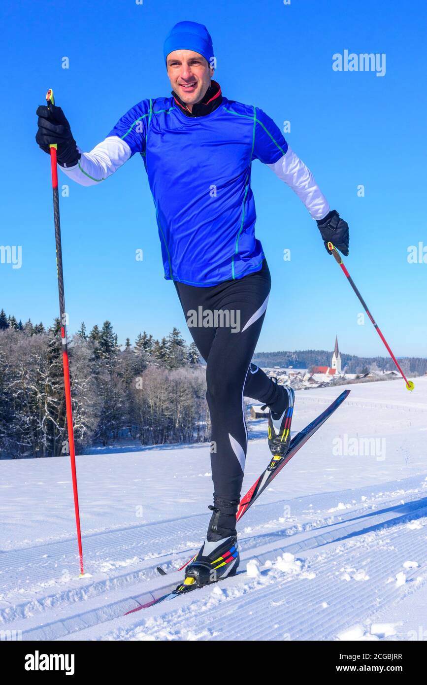 Expert doing cc-skiing in winter Stock Photo