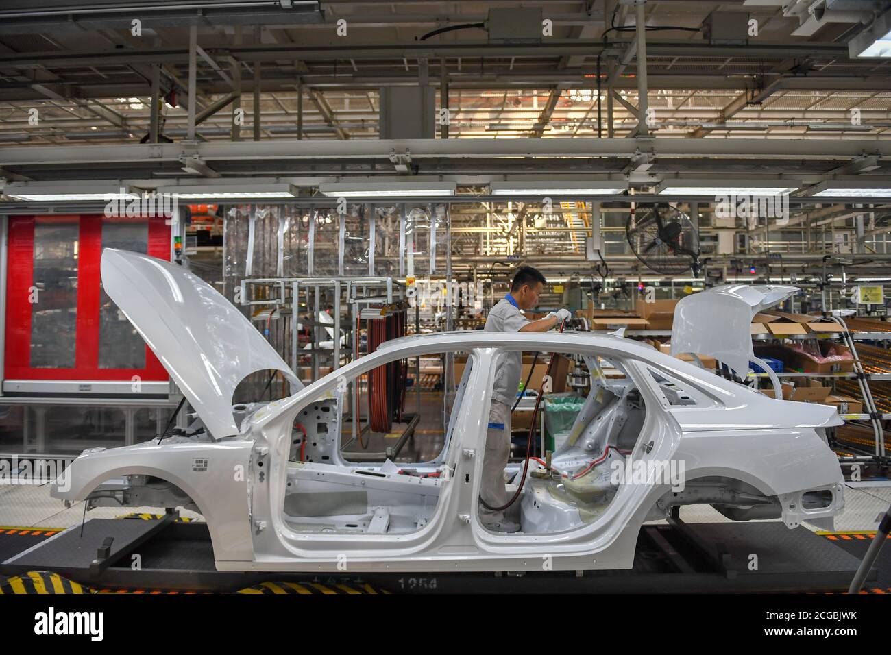 Changchun, China's Jilin Province. 1st Sep, 2020. An employee works at an assembly workshop of FAW-Volkswagen Automobile Co., Ltd. in Changchun, capital of northeast China's Jilin Province, Sept. 1, 2020. First Automotive Works (FAW) Group Co., Ltd., China's leading automaker, sold 314,454 vehicles in August, up 14 percent year on year, according to corporate sources. Credit: Zhang Nan/Xinhua/Alamy Live News Stock Photo
