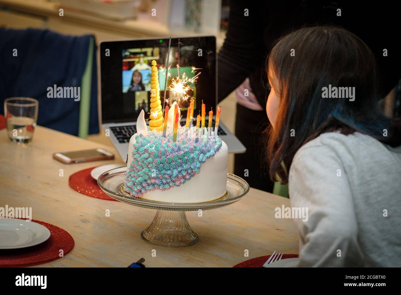 A child's Birthday party being held online (Zoom) during COVID-19 lockdown, Melbourne Australia Stock Photo