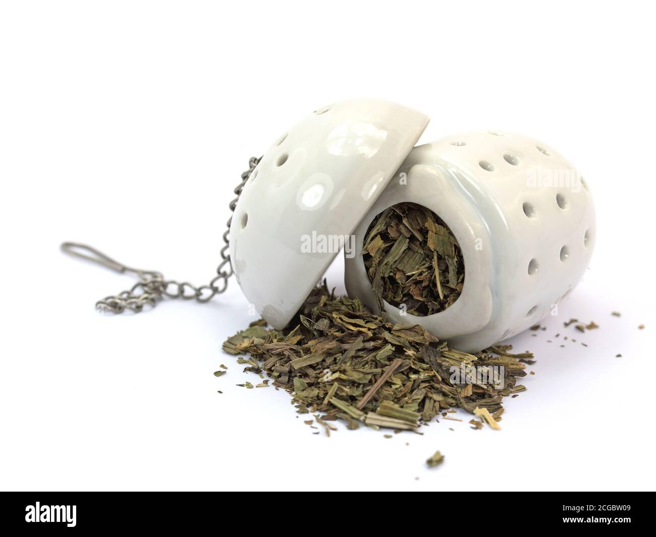 Tea strainer with herbal tea Stock Photo