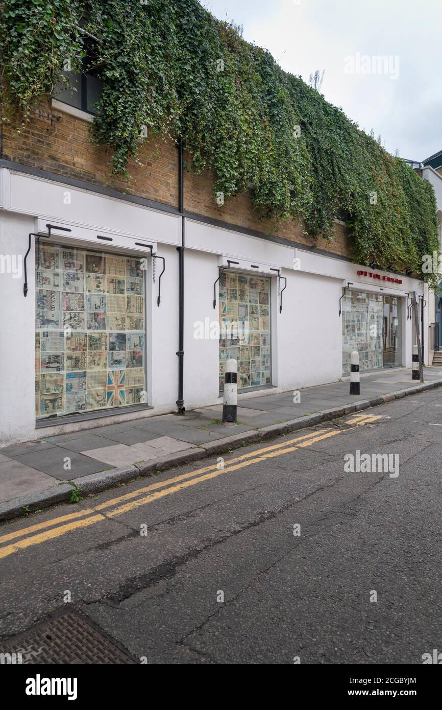 The temporarily closed Ottolenghi restaurant in Artillery Lane, Spitalfields with newspapers blocking the windows. Stock Photo