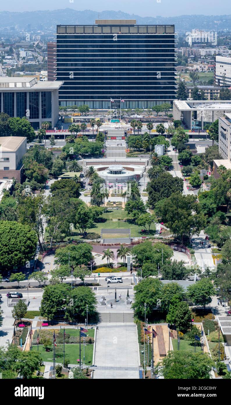 A summer day shot of John Ferraro Building (Los Angeles Department of Water and Power) 1964, Grand Park (part of the larger Grand Avenue Project) 2012, California, USA Stock Photo