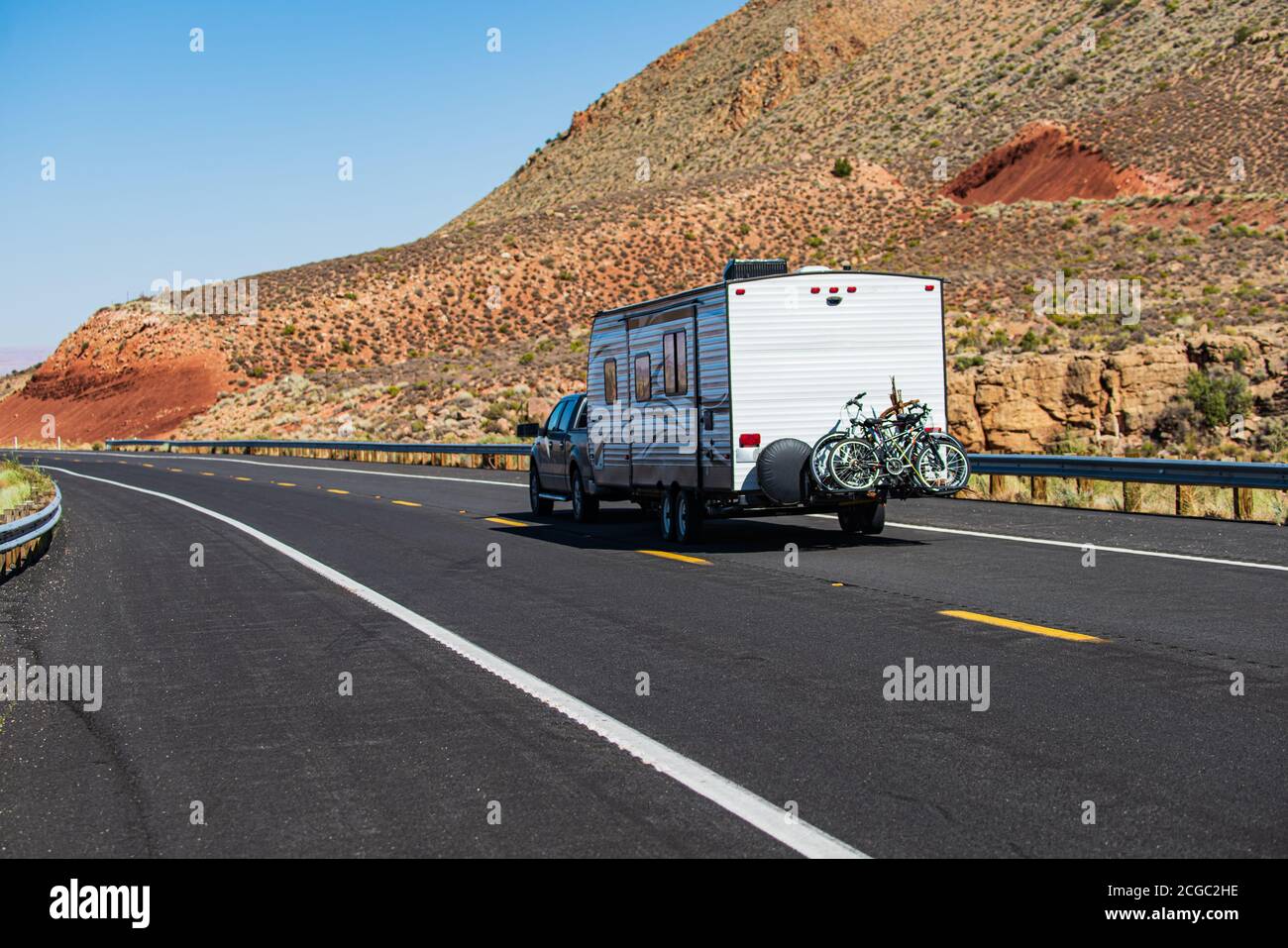 Mohave desert by Route 66. RV Camping, Camper Van on road. Caravan or  recreational vehicle motor home trailer on a mountain road in America Stock  Photo - Alamy