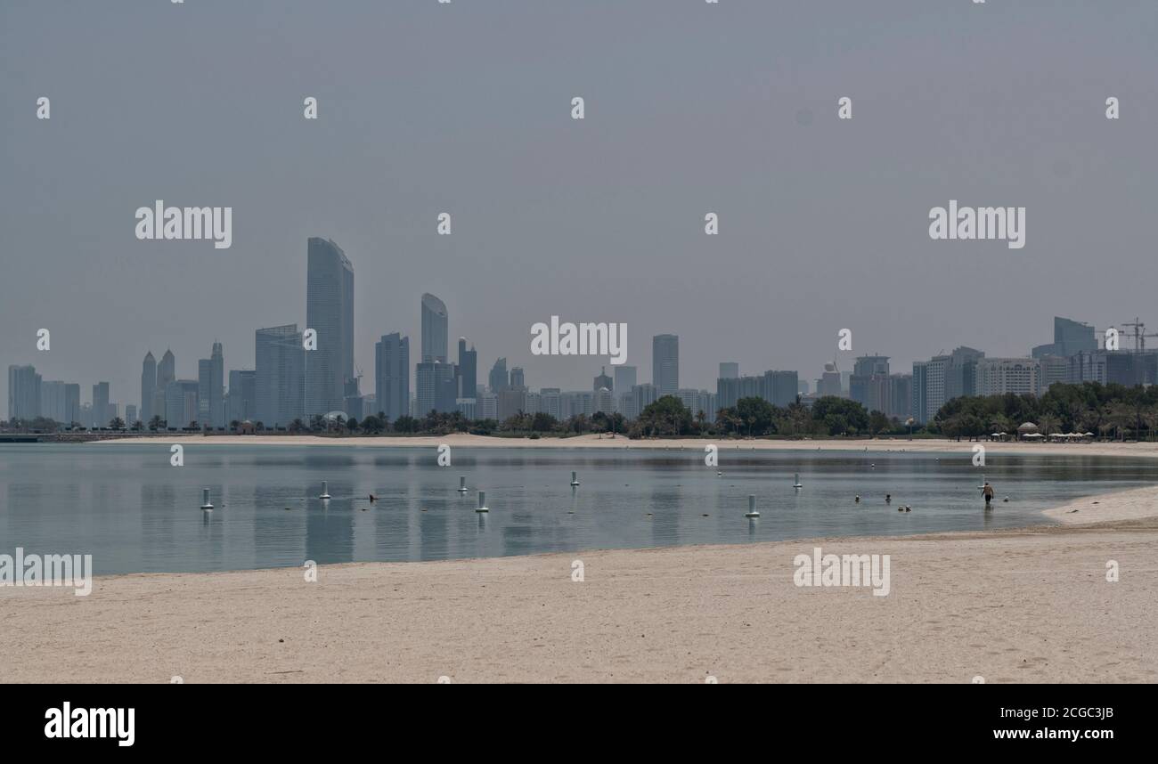 The Emirate Palace hotel beach front view of the skyline of Abu Dhabi's Corniche. Stock Photo