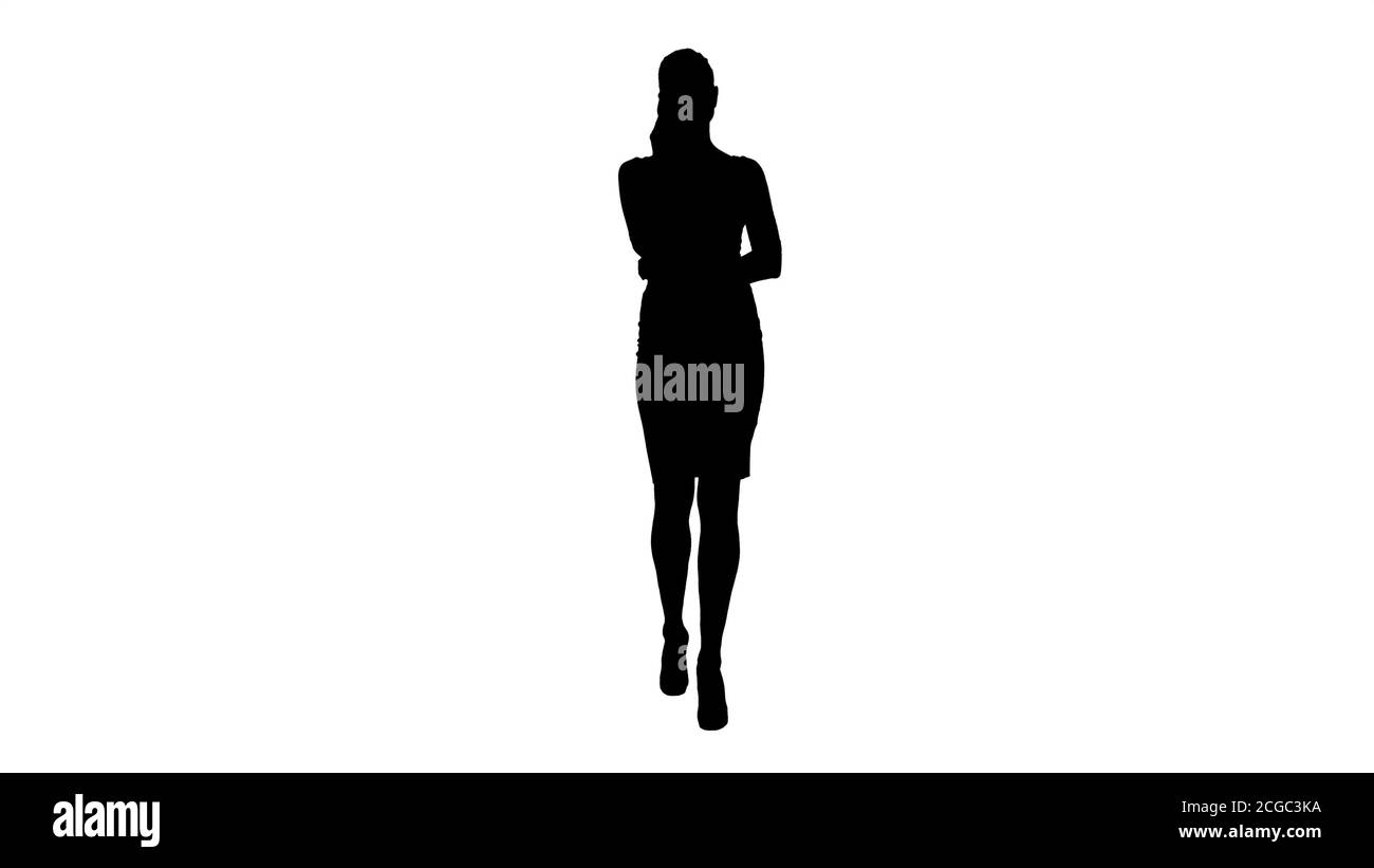 Silhouette Business Woman With Phone Calling And Walking. Stock Photo