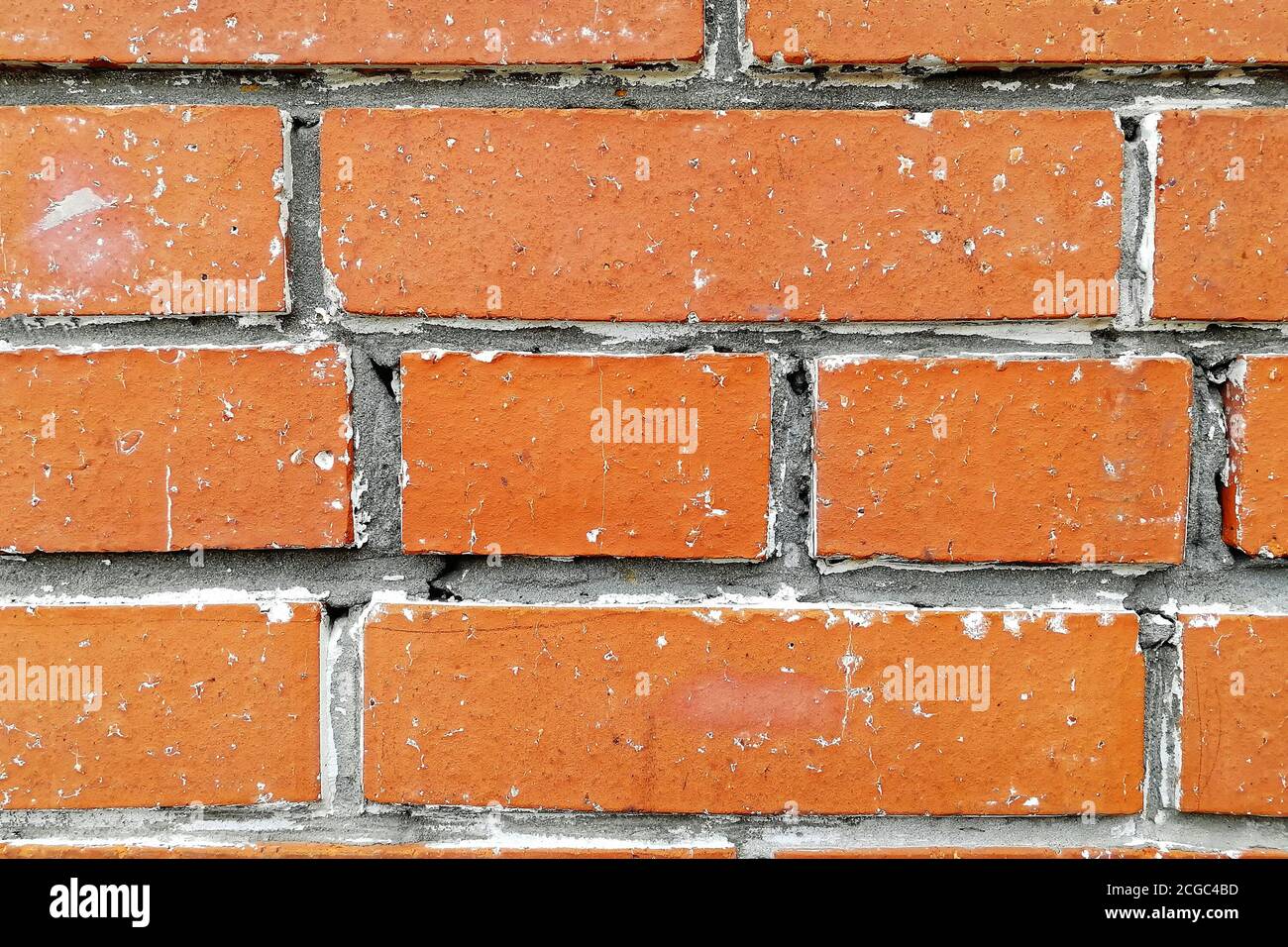 There is white salt on the cement joints. Front view. Abstract textured