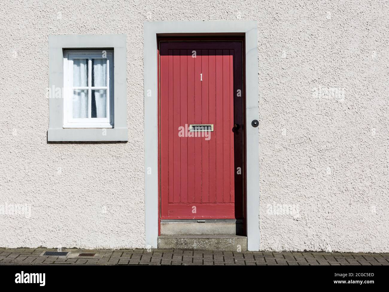 Red timber front door. Stock Photo