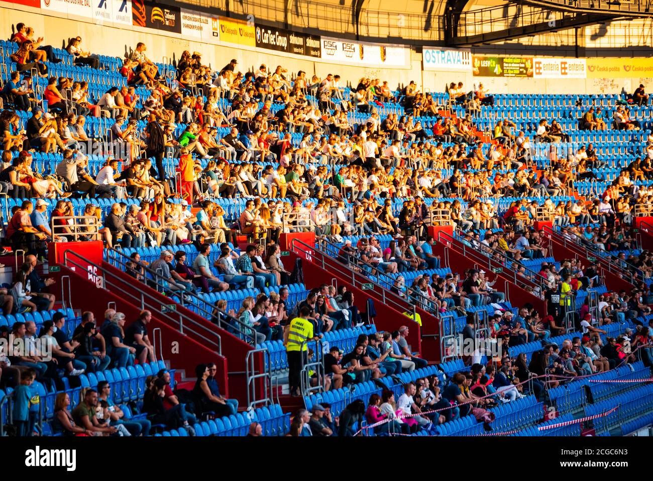 OSTRAVA, CZECH REPUBLIC, SEPTEMBER. 8. 2020: Social distancing sitting on sport stadium. Fans on stadium in post corona time Stock Photo