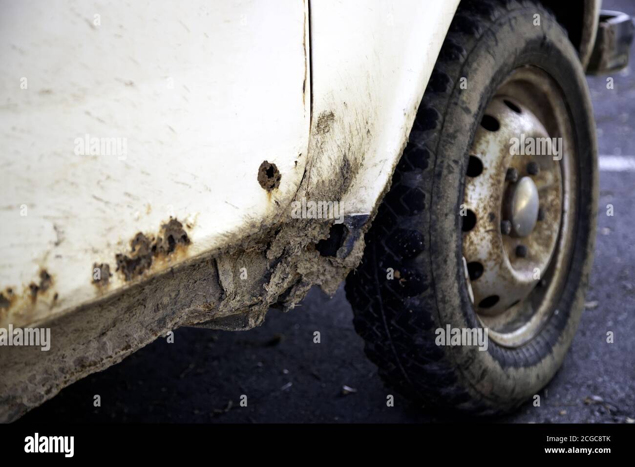 Muddy and rusty car wheels, transport and vehicle, travel Stock Photo