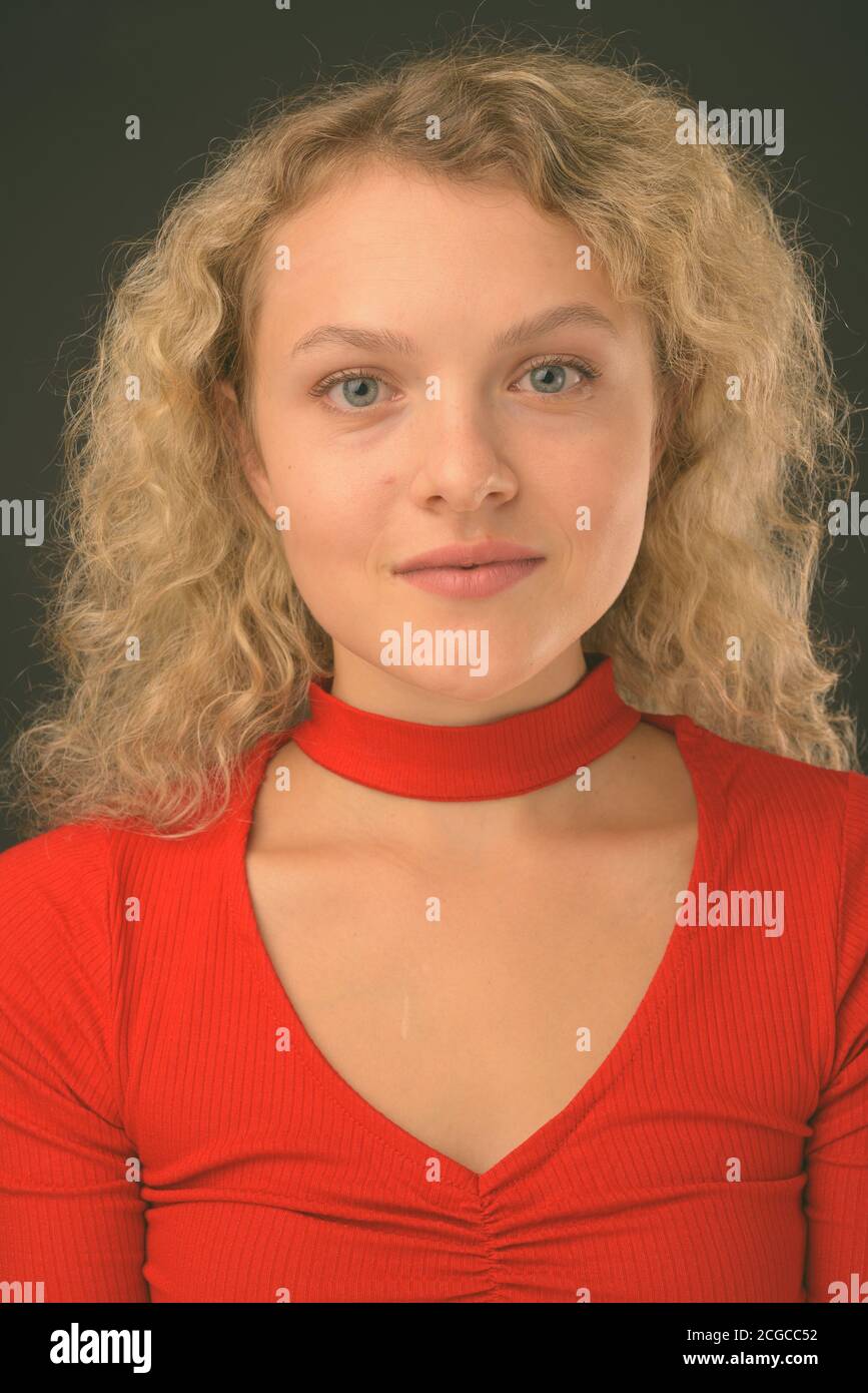 Beautiful woman with curly hair hi-res stock photography and images - Alamy