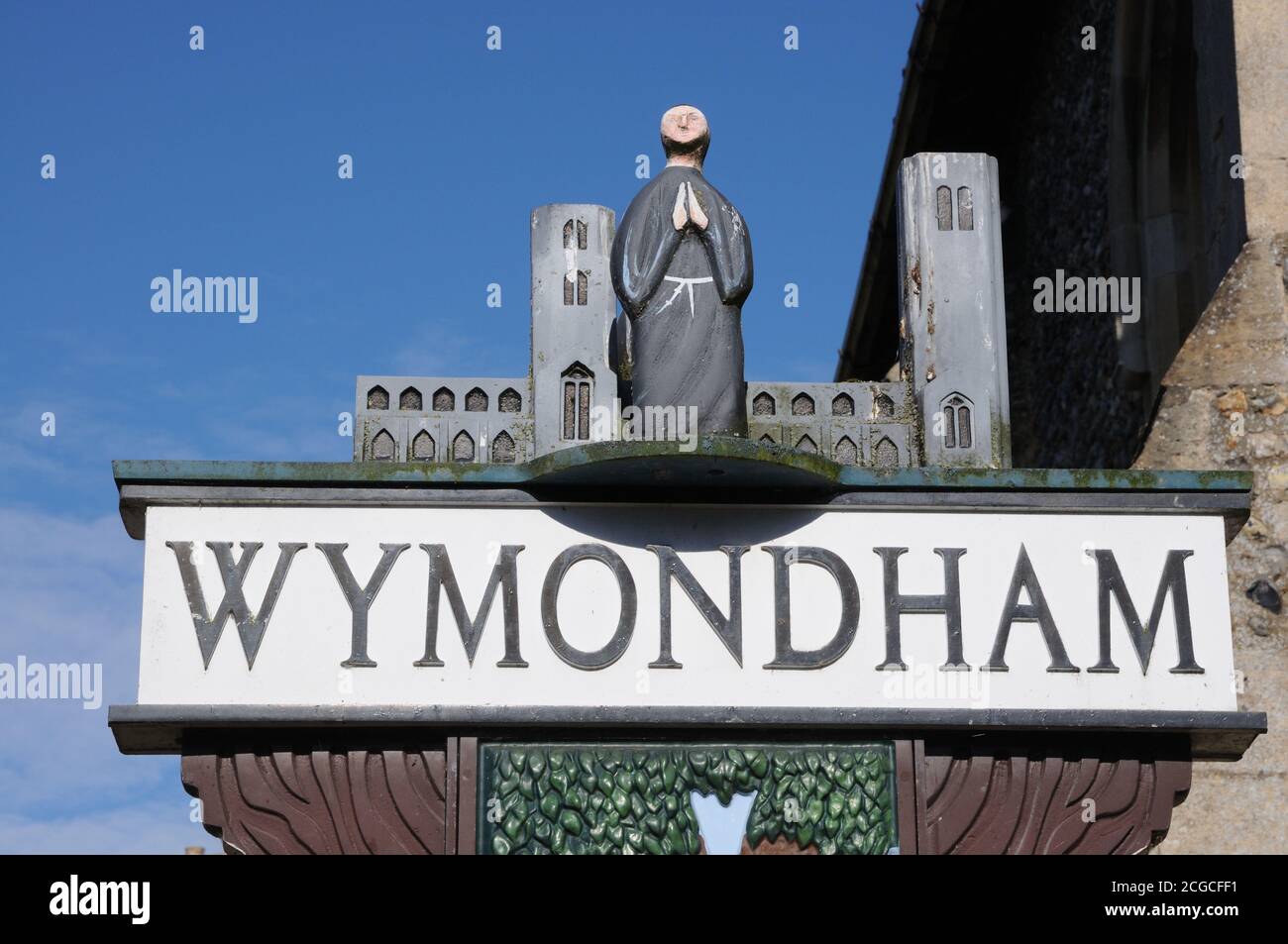 Town sign, Wymondham, Norfolk. One side depicts Robert Kett, and a wood