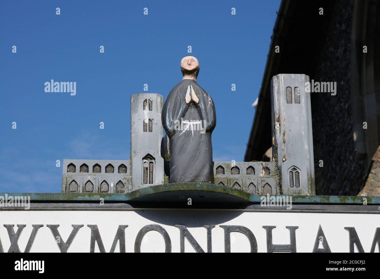 Town sign, Wymondham, Norfolk. One side depicts Robert Kett, and a wood