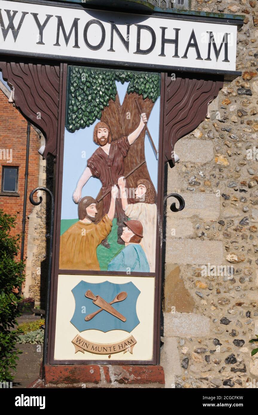 Town sign, Wymondham, Norfolk. One side depicts Robert Kett, and a wood