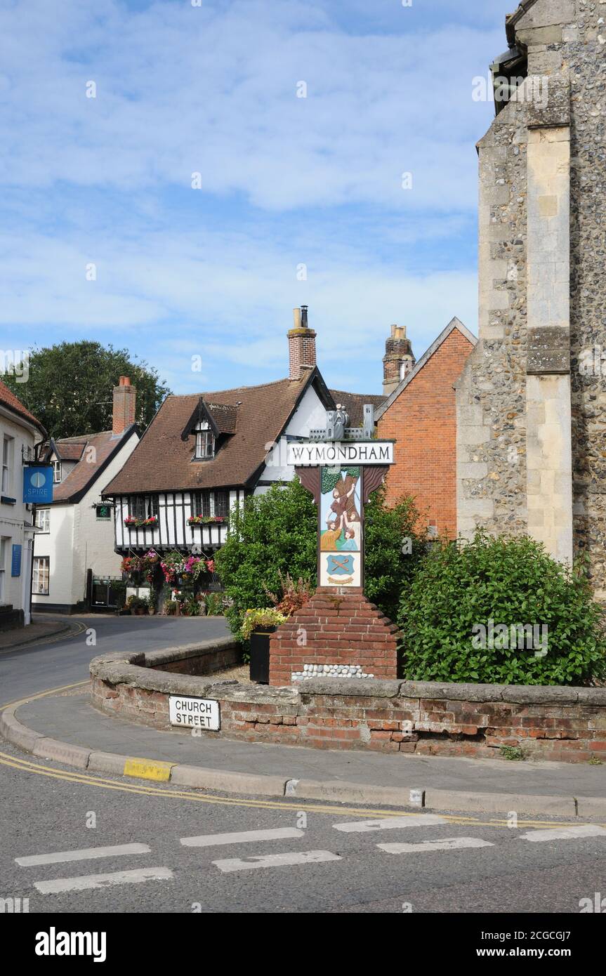 Town sign, Wymondham, Norfolk. One side depicts Robert Kett, and a wood