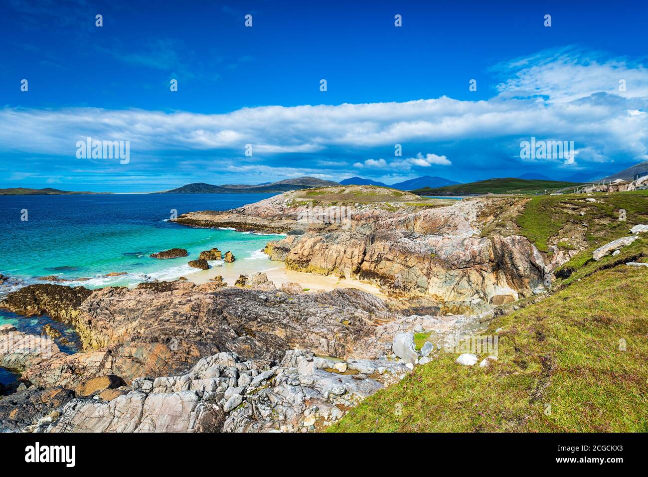 The wild and rugged coastline at Seilebost on the Isle of Harris in the Outer Hebrides of Scotland Stock Photo