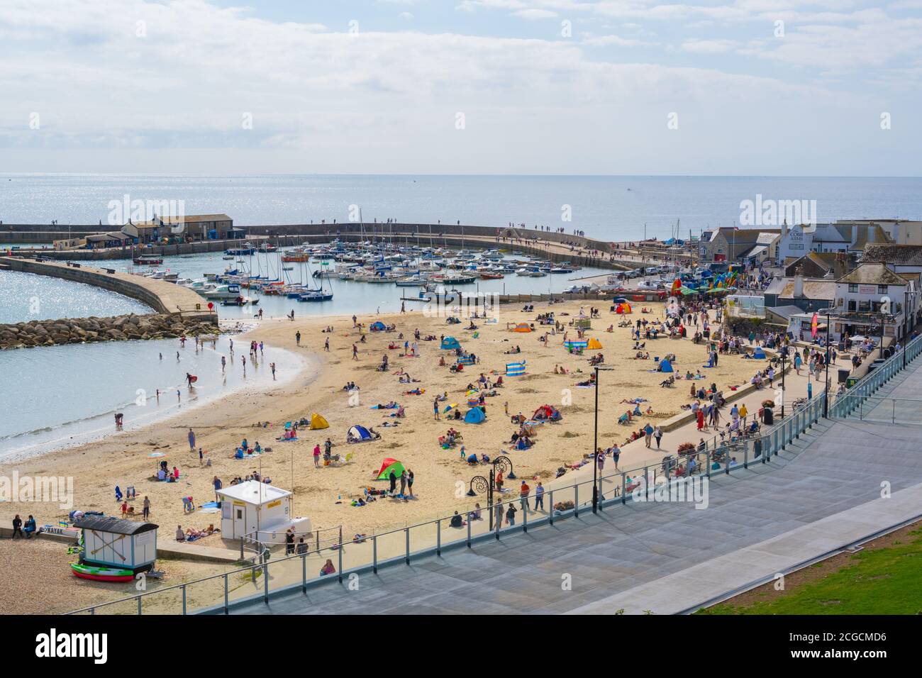 Lyme Regis, Dorset, UK. 10th Sep, 2020. UK Weather: There were plenty of people out and about enjoying the lovely warm September sunshine at the seaside resort of Lyme Regis ahead of the mini heatwave and 'Indian Summer' forecast over the weekend. Credit: Celia McMahon/Alamy Live News Stock Photo