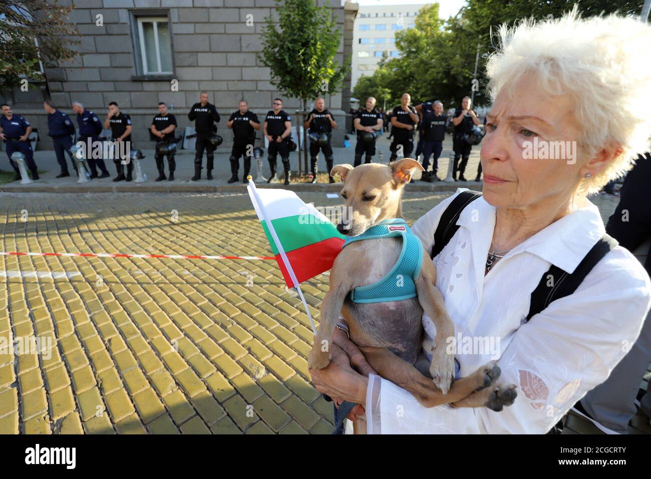 September 10, Sofia, Bulgaria: 64th day of protests against the mafia, the government and Attorney General Ivan Geshev. People unroll the Bulgarian fl Stock Photo
