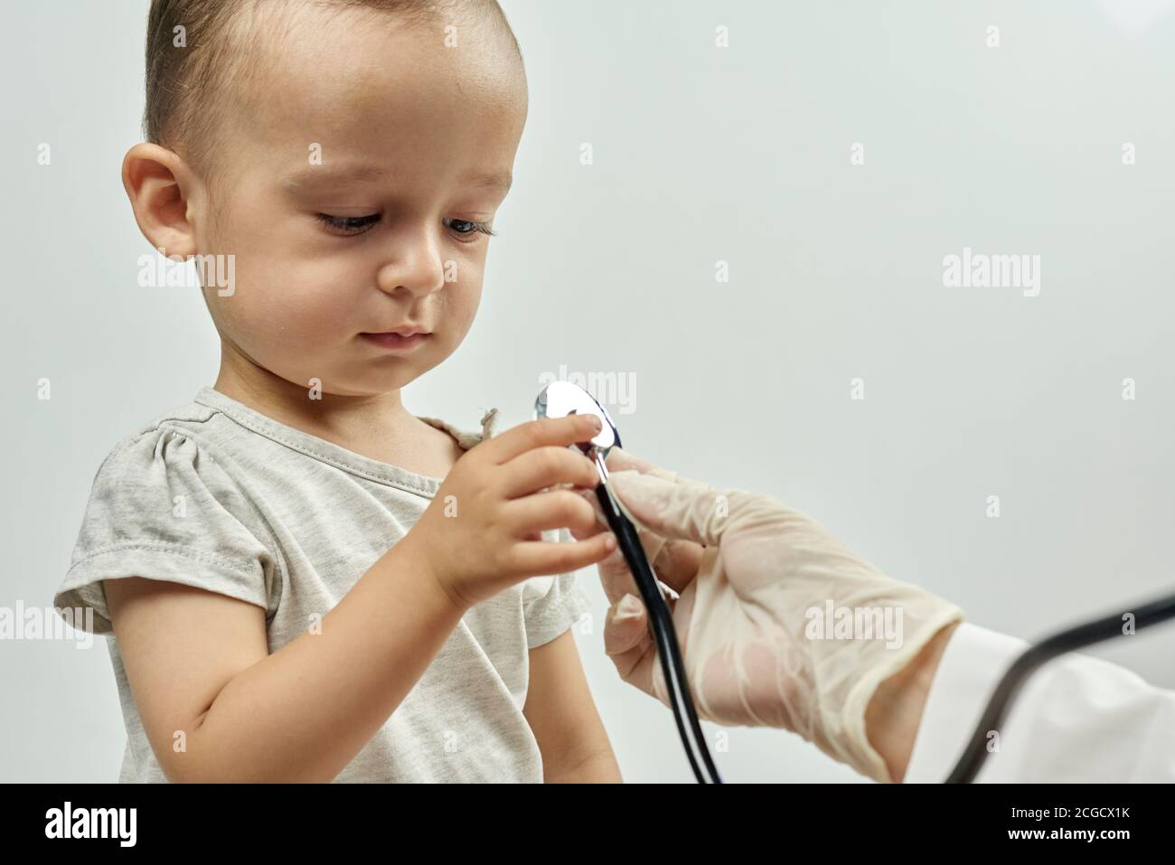Physical examination of the 1 year old baby boy. Wellbaby exam