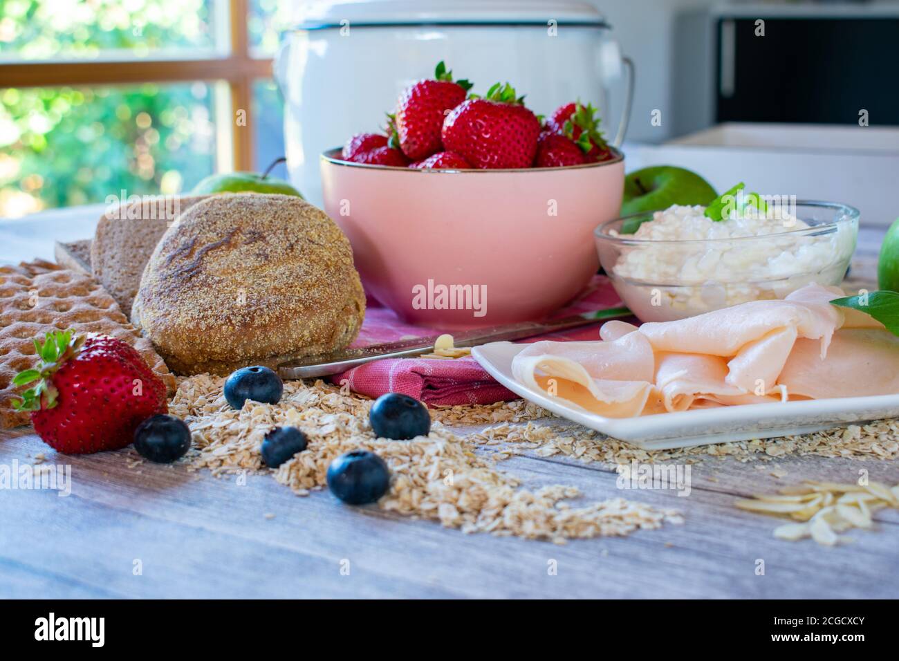 Healthy breakfast  whole food  low fat , low calorie bread, fruits and proteins Stock Photo