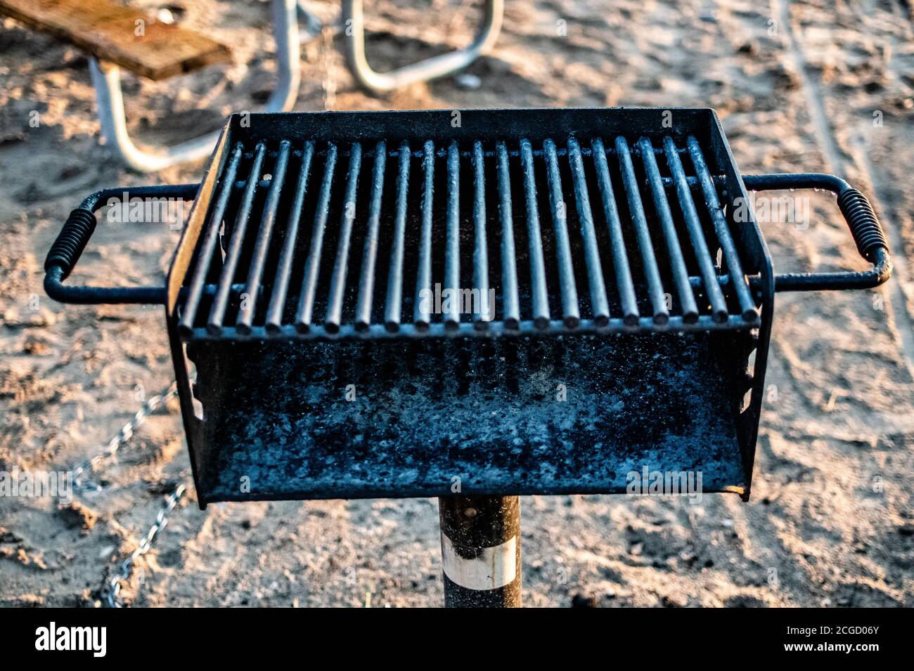 Metal grill on beach Stock Photo Alamy