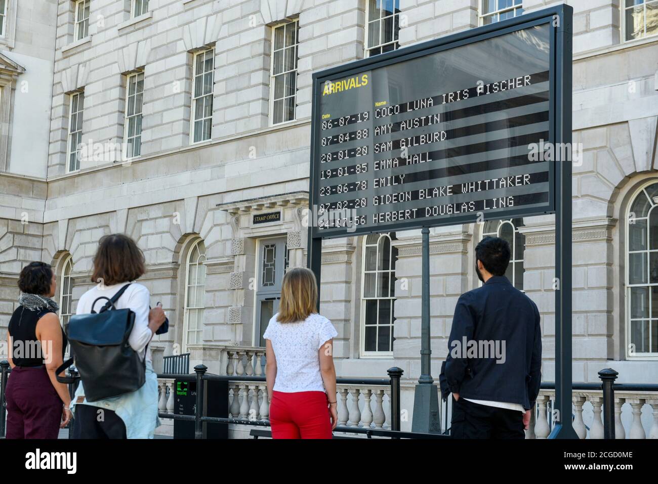 London, UK.  10 September 2020.  Staff members view Arrivals + Departures, a major interactive installation in the courtyard of Somerset House by Yara and Davina.  The artwork allows the public to memorialise their names on the mechanical flipboards which are often seen at a railway station or airport and is on show until 10 October 2020. Credit: Stephen Chung / Alamy Live News Stock Photo