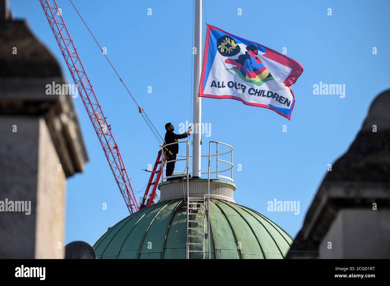 EMBARGOED TO 17 SEPTEMBER 2020  London, UK.  10 September 2020. All Our Children, a new flag made out of recycled polyester by fashion designer Bethany Williams, is raised at Somerset House ahead of London Fashion Week. Credit: Stephen Chung / Alamy Live News Stock Photo