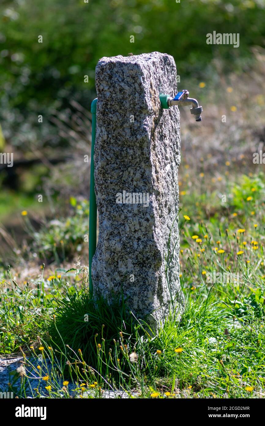 Outdoor faucet in rural farm for fire prevention and agriculture purposes Stock Photo