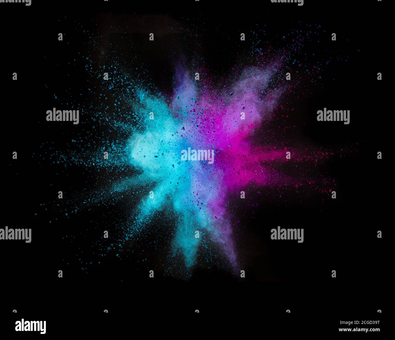 Colored powder explosion isolated on black background Stock Photo - Alamy