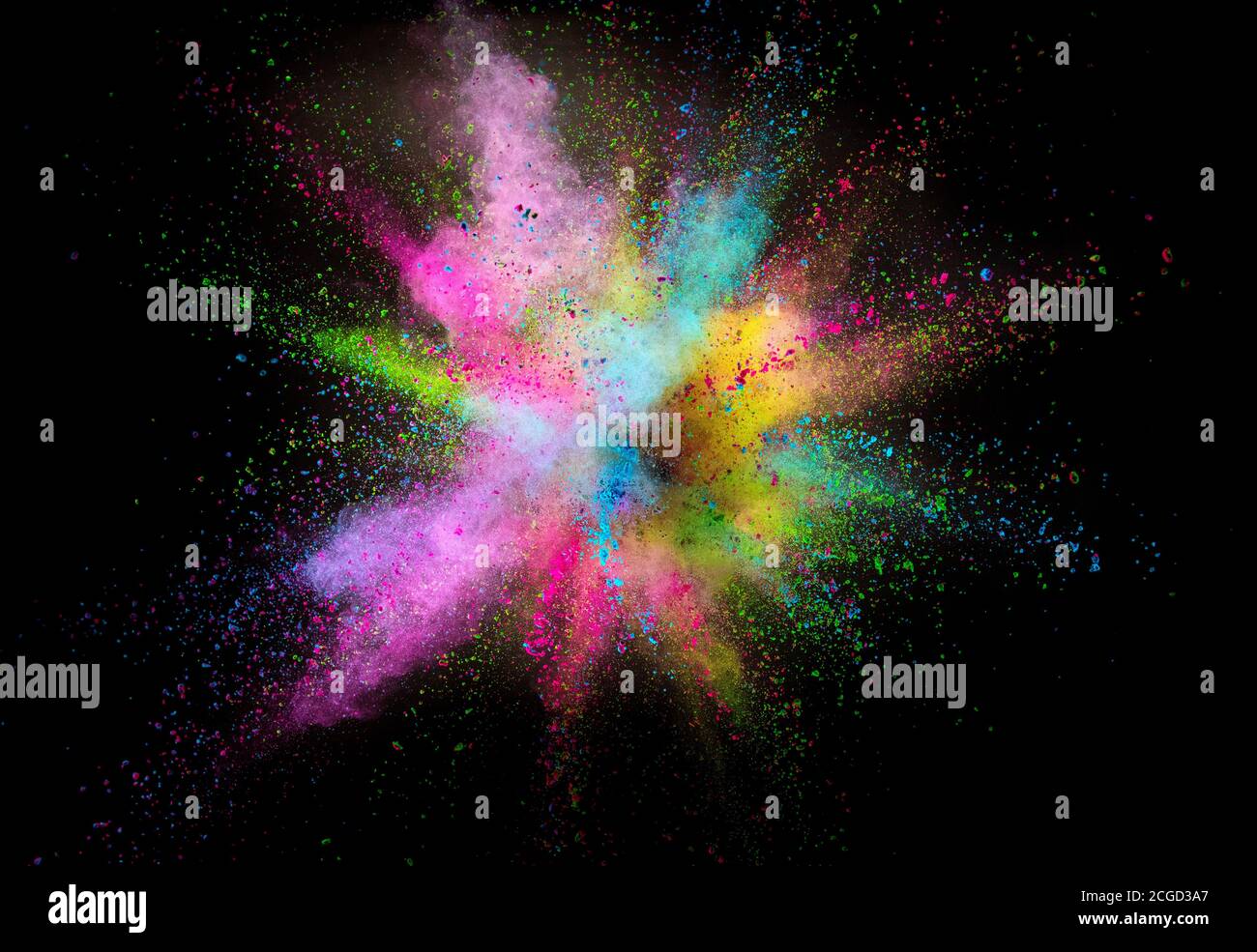 Colored powder explosion isolated on black background Stock Photo - Alamy